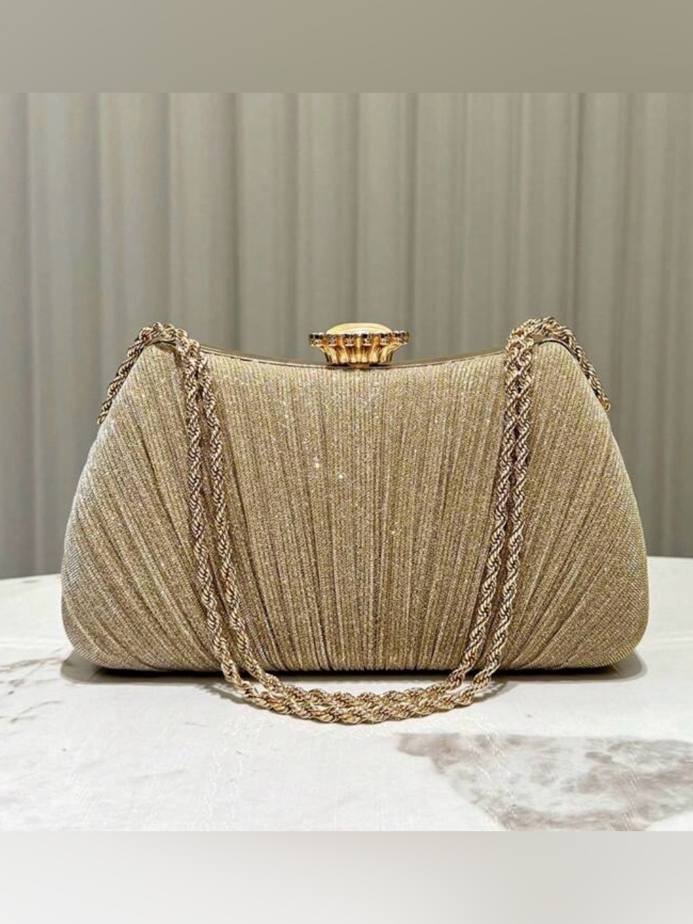Elegant Gold Evening Clutch with Braided Chain Strap